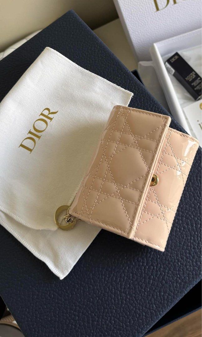 Lady Dior Lotus Wallet (Category: Luxury Bags & Wallets) located in Manila. Submitted by athenafinds (Listing ID 1406214115, Image 1). Description: Unused original price 40k 😊 with dustbag and box no receipt.