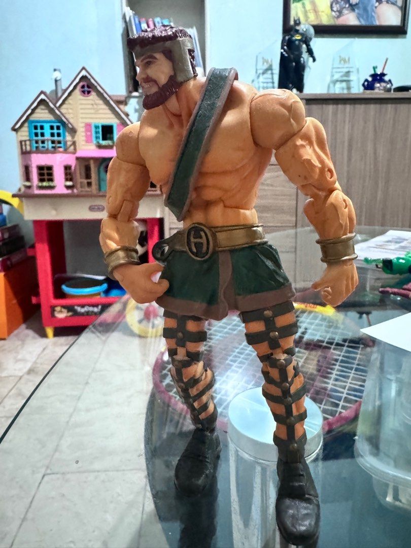 Marvel Legends Annihilus BAF Series - Hercules Action Figure (Category: Figurines & Statues) located in Quezon City. Submitted by princesspatsy100 (Listing ID 1406212062, Image 1). Description: - Hercules action figure - Detailed design - Muscular physique - Green and gold color scheme - Intricate leg and arm detailing - Collectible item.