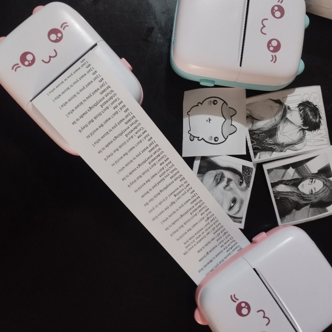 Mini Portable Wireless Bluetooth Thermal Photo Pocket Printer (Category: Printers, Scanners & Copiers) located in Tarlac. Submitted by zy.aniks (Listing ID 1406279660, Image 2). Description: What’s Included: ҂ Box ҂ (2) Sticker Papers + (1) Plain Paper ҂ Type-C Charging Cable ҂ Instruction Manual Perfect for: 📝 Notes, To-Do Lists, Receipts, & Waybill 📸 Photos & Creative Prints 🎨 Journaling, Scrapbooks, Labels, and More!.