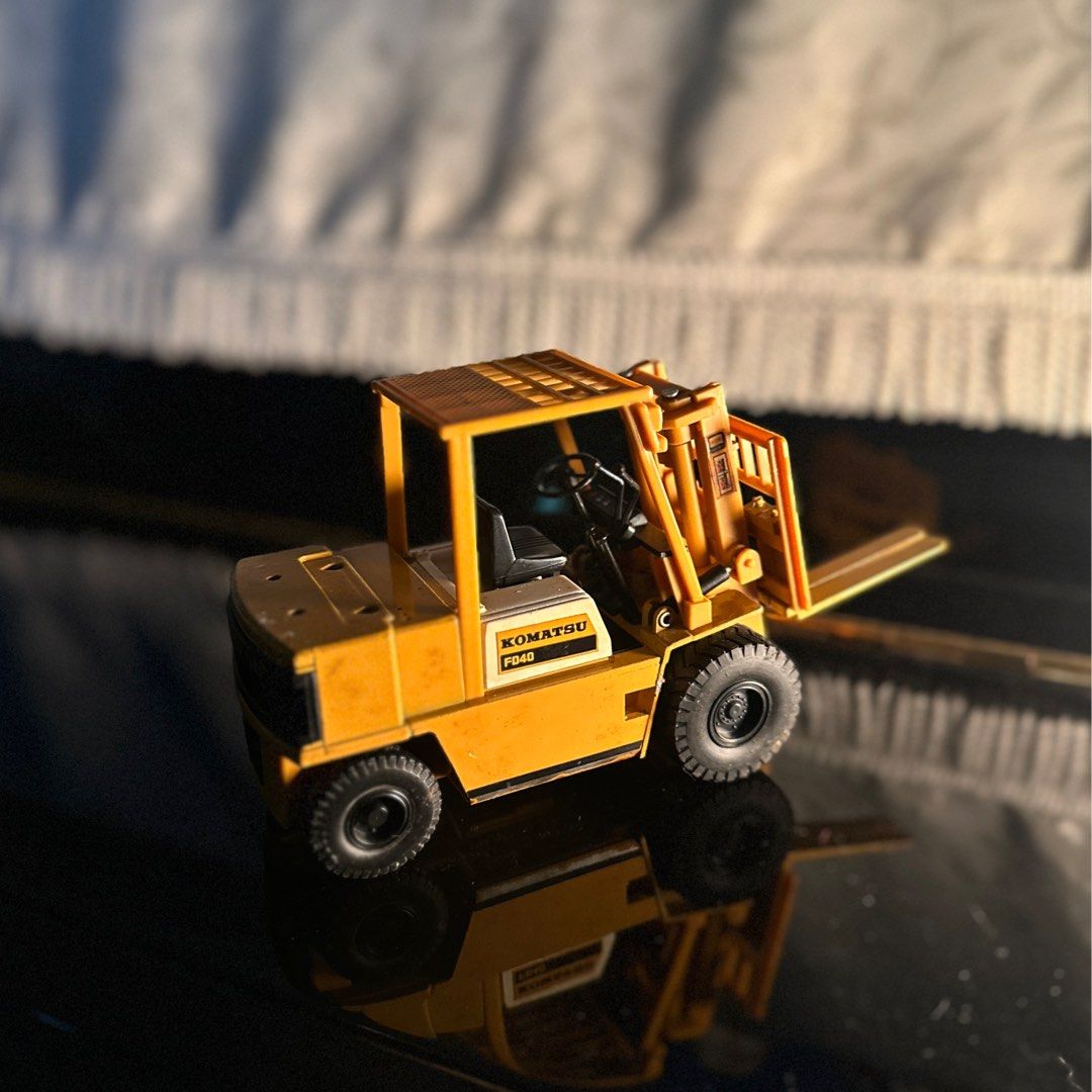 Mini Power Wide W-01 Komatsu Forklift FD40 (Category: Vintage Collectibles) located in Singapore. Submitted by melattempts (Listing ID 1406253127, Image 2). Description: Vintage Collectible Toy ✨Letting go of this beauty (over 30 years) that’s been with us for a long time. It comes with the original box and shows natural wear & tear due to age, perfect for collectors who appreciate classics! 💛 Just hoping it finds a new home with someone who’ll 