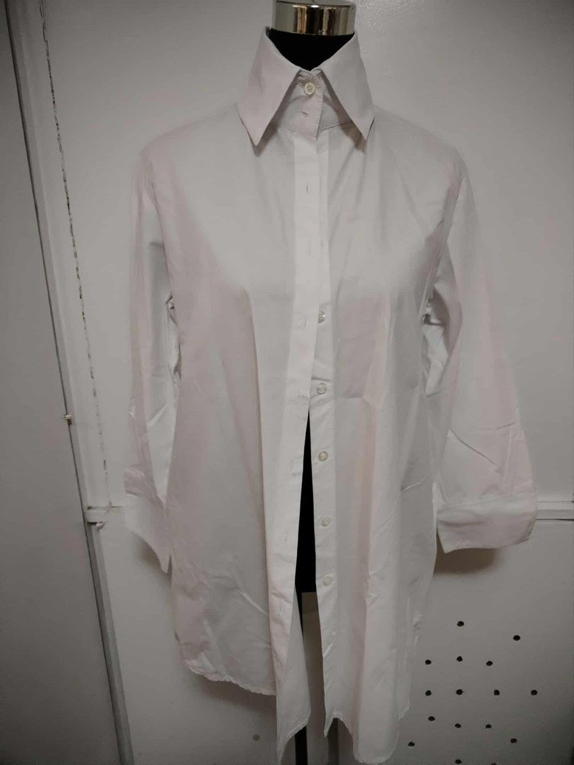 Mosaic White Long Sleeve Shirt (Category: Blouses) located in Pasig City. Submitted by jacq0301 (Listing ID 1406127779, Image 1). Description: - Mosaic white long sleeve shirt - Classic collar and button-down front - Longer length - Pleated back detail - Visible stains on front and collar - Roll-up sleeves - Lightweight fabric.