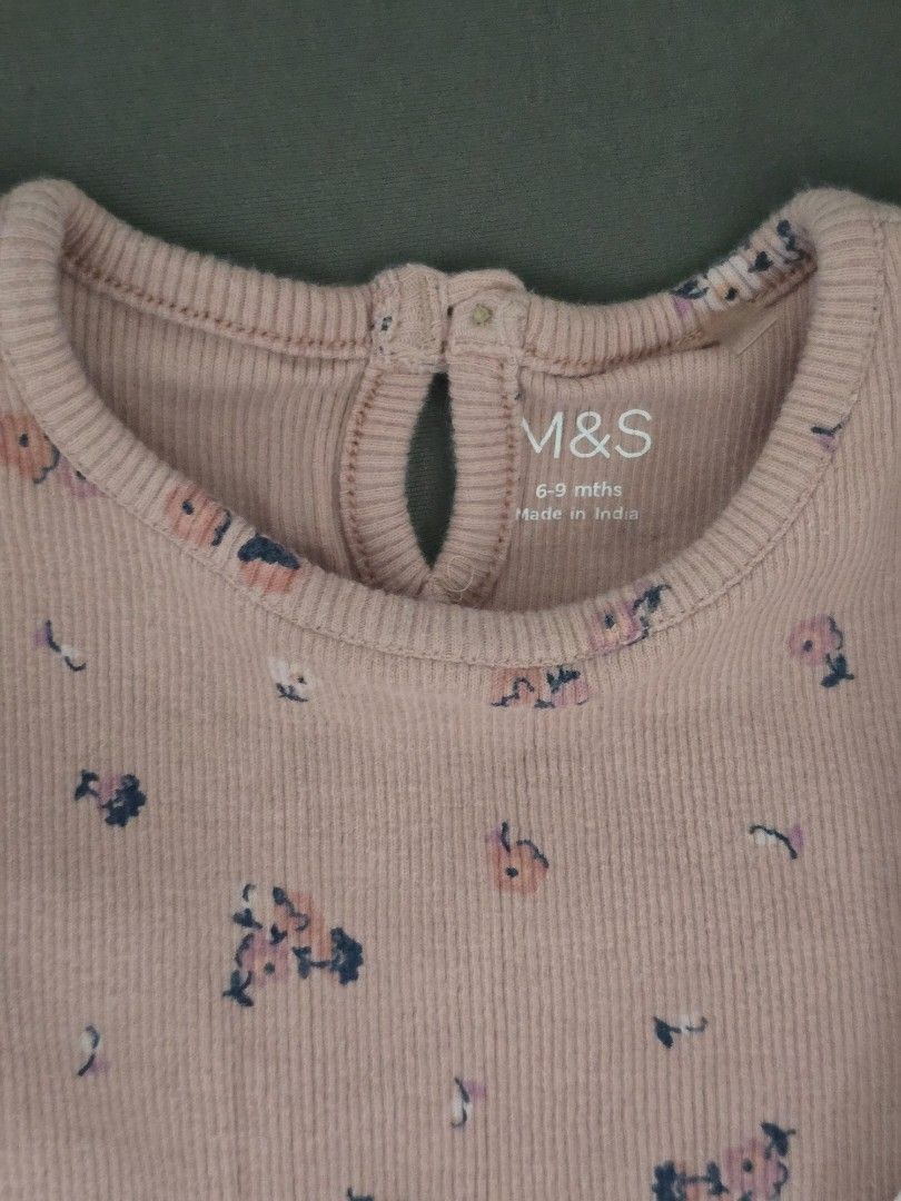 M&S 3-Part Set (6-9 Months) (Category: Babies & Kids Fashion) located in Navotas City. Submitted by declutteringwithkc (Listing ID 1406256897, Image 2). Description: - M&S 3-piece baby set - Size: 6-9 months - Includes: - Pink floral long-sleeved top - White top with mouse graphic - Navy blue top - Matching pink and white pants (lightly pink in color) - Pink top has button closure at the back. Originally bought the tops and bottoms separately. .