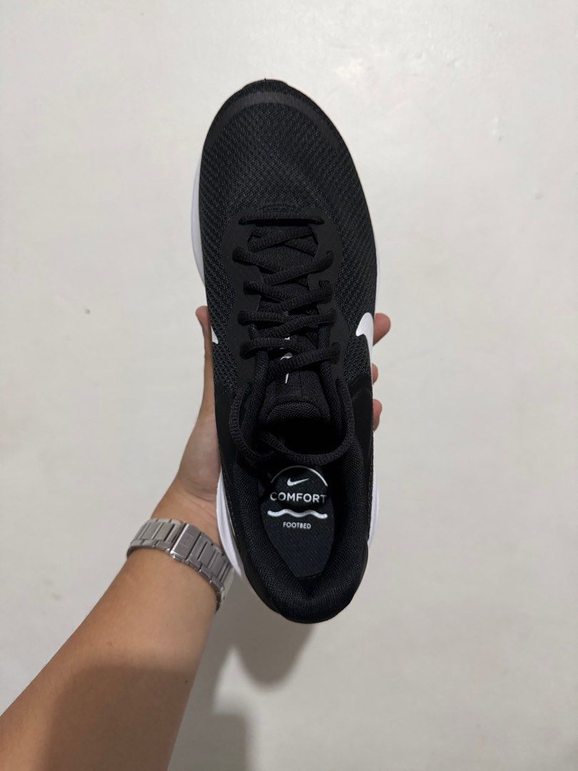 Nike Revolution 7 Black White Running Shoes (Category: Sneakers) located in Mandaluyong City. Submitted by civquicio (Listing ID 1406255151, Image 3). Description: - Nike Revolution 7 - Color: Black and White - US Size: 9 & 10 -₱1450 Guaranteed 100% original Money back guaranteed if proven fake For delivery: lalamove/ grab / j&t Location: Mandaluyong / Cubao.