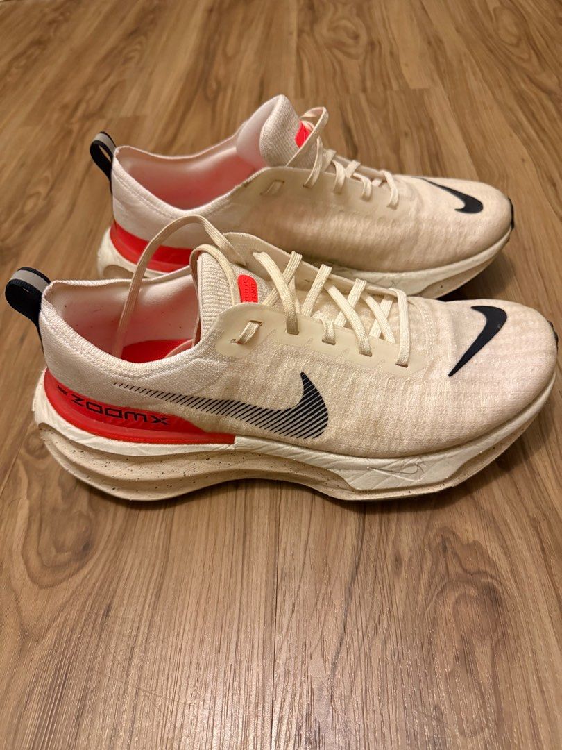 Nike ZoomX Invincible Run 3 Flyknit - Size 10 (Category: Sneakers) located in Taguig. Submitted by regpaj (Listing ID 1406247649, Image 3). Description: - Nike ZoomX Invincible Run Flyknit - Color: Cream and Red - Size: US 10 - Features: - Black Nike swoosh logo - ZoomX midsole - Flyknit upper - Condition: Some wear on soles - Includes original laces.