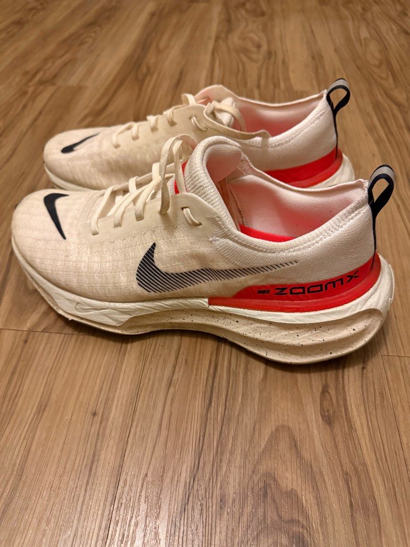 Nike ZoomX Invincible Run 3 Flyknit - Size 10 (Category: Sneakers) located in Taguig. Submitted by regpaj (Listing ID 1406247649, Image 1). Description: - Nike ZoomX Invincible Run Flyknit - Color: Cream and Red - Size: US 10 - Features: - Black Nike swoosh logo - ZoomX midsole - Flyknit upper - Condition: Some wear on soles - Includes original laces.