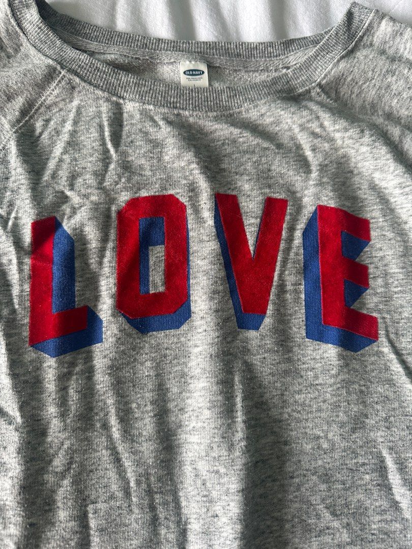 Old Navy Love Oversized Sweatshirt - Gray (Category: Longsleeves) located in Quezon City. Submitted by heavenlyfool (Listing ID 1406171433, Image 2). Description: - Gray Old Navy oversized sweatshirt with "LOVE" graphic - size: L but very loose and oversized fit - plus size friendly, fits large-xl frames - check pics for measurements 📍location: Commonwealth, QC 💸 mode of payment: gcash or bpi bank transfer 💌 shipping via lalamove, grab or gogo