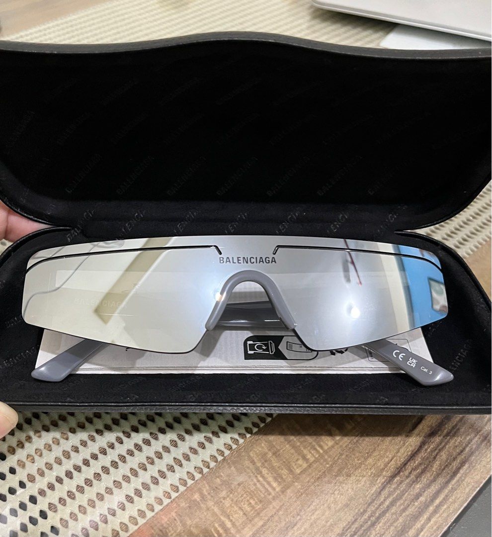 Original Balenciaga Ski Sunglasses (Category: Sunglasses & Eyewear) located in Marikina City. Submitted by itsmejerome3030 (Listing ID 1406274408, Image 3). Description: - Authentic Balenciaga ski sunglasses - Sleek grey frame with mirrored lenses - Includes original case, cleaning cloth, and paperwork - Made in Italy - Features Balenciaga logo - Model: BB0003S 011 99-21-140 M - Original market price: 28k - Used only once for an event PS I’ll mak