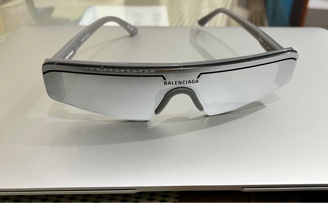Original Balenciaga Ski Sunglasses (Category: Sunglasses & Eyewear) located in Marikina City. Submitted by itsmejerome3030 (Listing ID 1406274408, Image 2). Description: - Authentic Balenciaga ski sunglasses - Sleek grey frame with mirrored lenses - Includes original case, cleaning cloth, and paperwork - Made in Italy - Features Balenciaga logo - Model: BB0003S 011 99-21-140 M - Original market price: 28k - Used only once for an event PS I’ll mak
