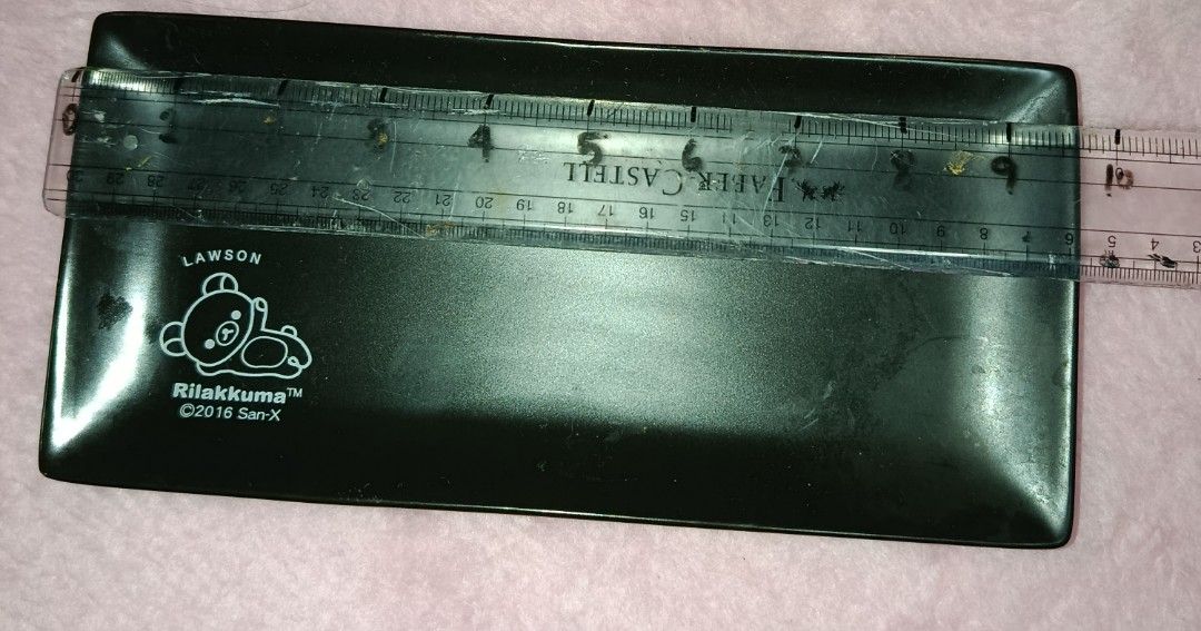Original Rilakkuma long rectangle black plate (Category: Dinnerware & Cutlery) located in Quezon City. Submitted by kristal68 (Listing ID 1406099747, Image 2). Description: rare find.