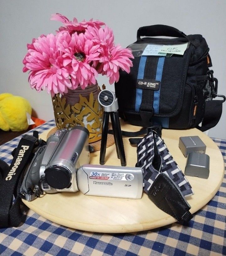 Panasonic PV-GS36 Camcorder with Accessories (Category: Video Cameras) located in Las Pinas. Submitted by indigo_blue88 (Listing ID 1406156684, Image 1). Description: - Panasonic PV-GS36 camcorder - 30x optical zoom - Includes: bag, extra strap, battery charger, and small tripod - Extra genuine Panasonic CGAA-DU12 battery included - Features one-touch navigation and joystick control - SD card NOT included - For Metro Manila buyers only.