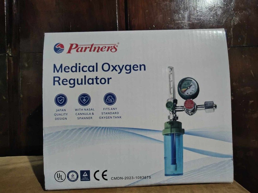 Partners Medical Oxygen Regulator (Category: Medical Supplies & Tools) located in Manila. Submitted by oplecherly24007 (Listing ID 1406281936, Image 1). Description: Medical oxygen regulator from Partners. Features Japan quality design, with nasal cannula and spanner, and fits any standard oxygen tank. Includes tubing and a gauge to monitor oxygen flow. The regulator has a green and red knob for adjustment. The product is in its original packagin