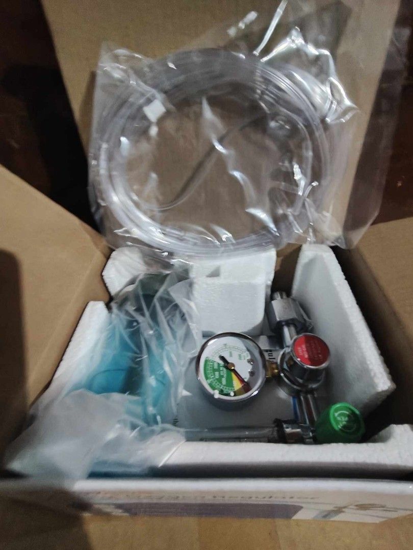 Partners Medical Oxygen Regulator (Category: Medical Supplies & Tools) located in Manila. Submitted by oplecherly24007 (Listing ID 1406281936, Image 2). Description: Medical oxygen regulator from Partners. Features Japan quality design, with nasal cannula and spanner, and fits any standard oxygen tank. Includes tubing and a gauge to monitor oxygen flow. The regulator has a green and red knob for adjustment. The product is in its original packagin