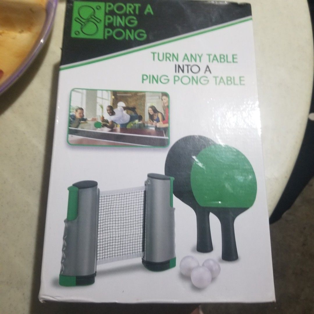 Port a Ping Pong Table Set (Category: Racket and Ball Sports) located in Paranaque City. Submitted by showboat (Listing ID 1406111366, Image 1). Description: - Converts any table into a ping pong table - Includes: - Retractable net - Two paddles - Three balls - Mesh carrying bag - Easy to store and transport - Perfect for fun and games!.