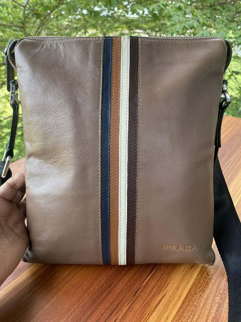 Prada sling bag (Category: Cross-body Bags) located in Oroquieta. Submitted by quickforest_8a519b (Listing ID 1406213673, Image 1). Description: genuine leather.medium ukay source.