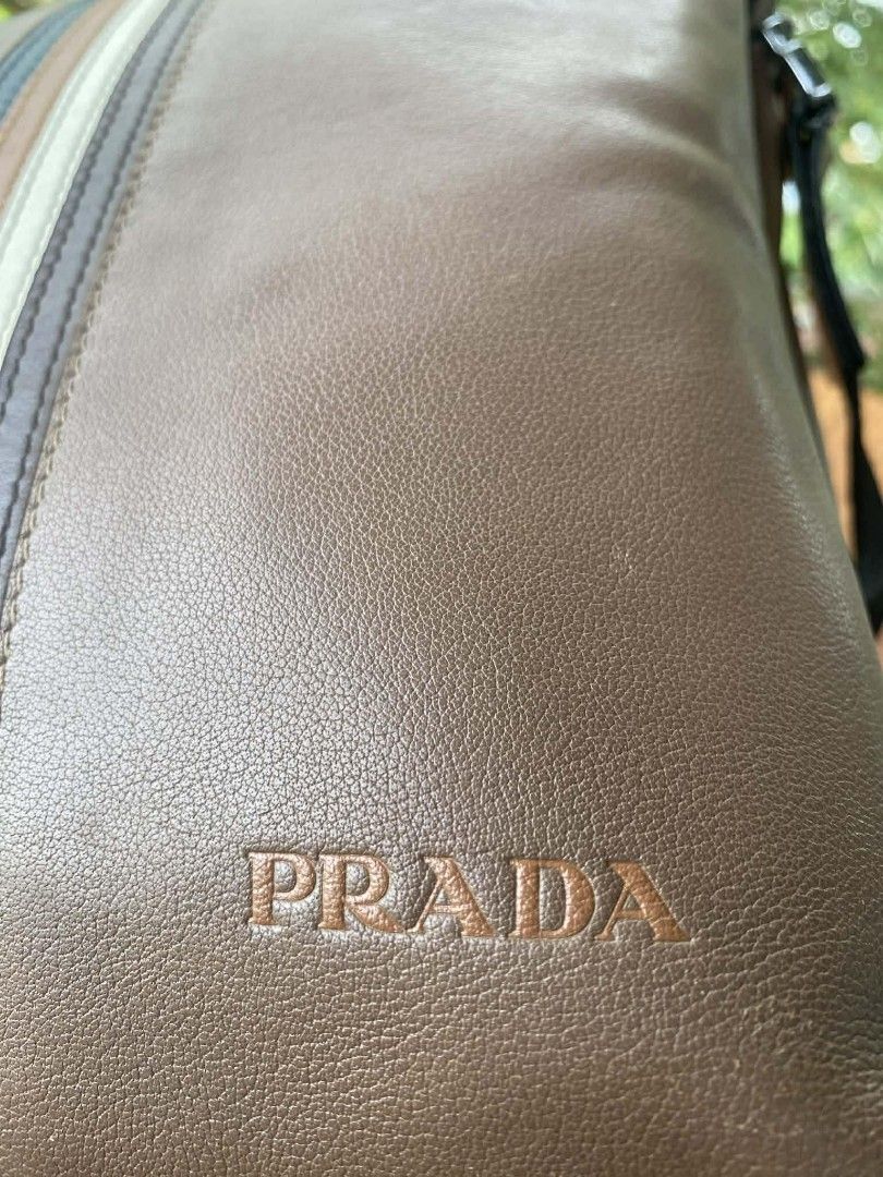 Prada sling bag (Category: Cross-body Bags) located in Oroquieta. Submitted by quickforest_8a519b (Listing ID 1406213673, Image 2). Description: genuine leather.medium ukay source.