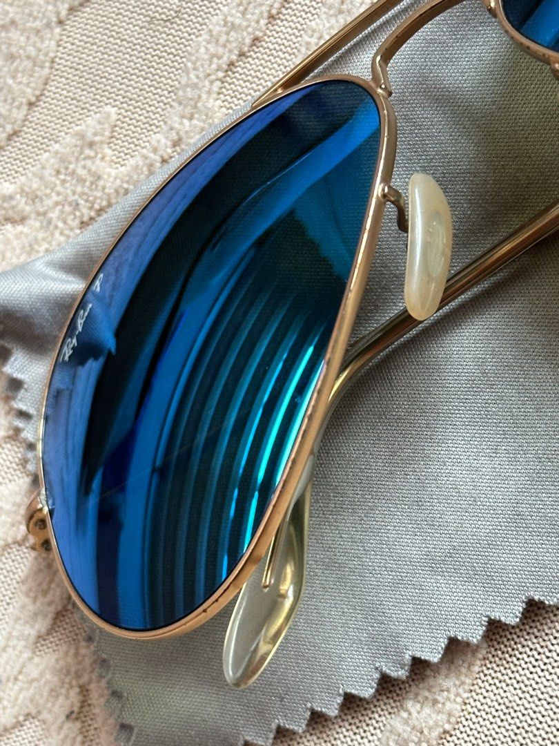 Ray-Ban Aviator Polarized Sunglasses Womens (Category: Sunglasses & Eyewear) located in Calamba. Submitted by gurleeg (Listing ID 1406106124, Image 3). Description: - Authentic Ray-Ban Aviator Womens sunglasses - Blue lenses - Gold frame -Large Size - Includes case - Comes with cleaning cloth - Original price tag attached - Classic and stylish design.
