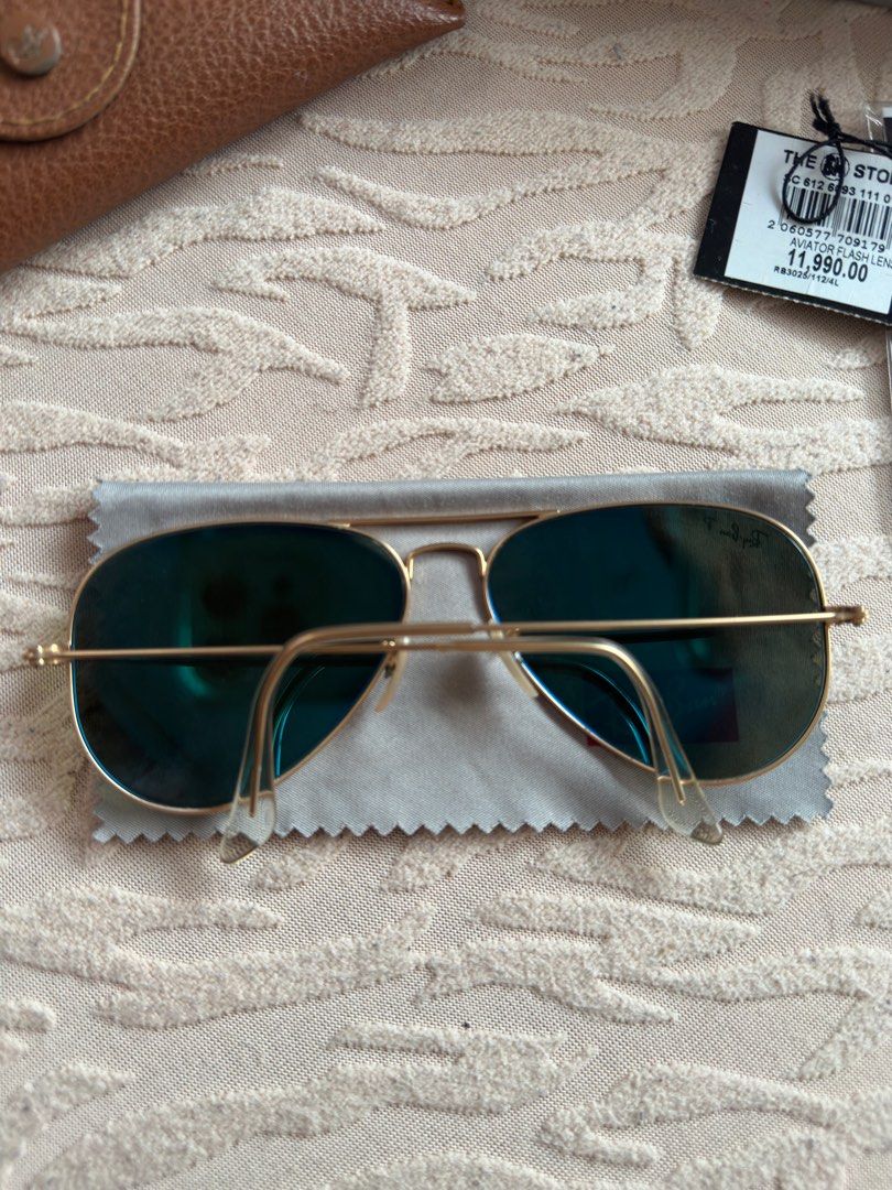 Ray-Ban Aviator Polarized Sunglasses Womens (Category: Sunglasses & Eyewear) located in Calamba. Submitted by gurleeg (Listing ID 1406106124, Image 2). Description: - Authentic Ray-Ban Aviator Womens sunglasses - Blue lenses - Gold frame -Large Size - Includes case - Comes with cleaning cloth - Original price tag attached - Classic and stylish design.