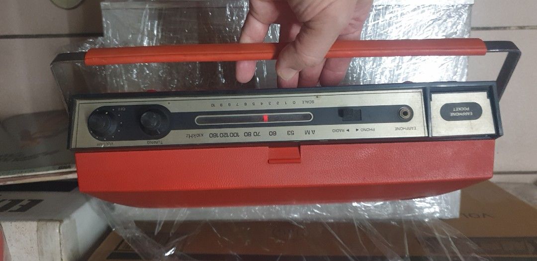 Red Columbia Radio Phono Player (Category: Portable Music Players) located in Manila. Submitted by zandre615 (Listing ID 1406178716, Image 2). Description: Vintage columbia radio & phono player plays both 33 & 45 vinyl Working am radio, phono player working 100V ac, no transformer included Issue: missing back cover Manila area.