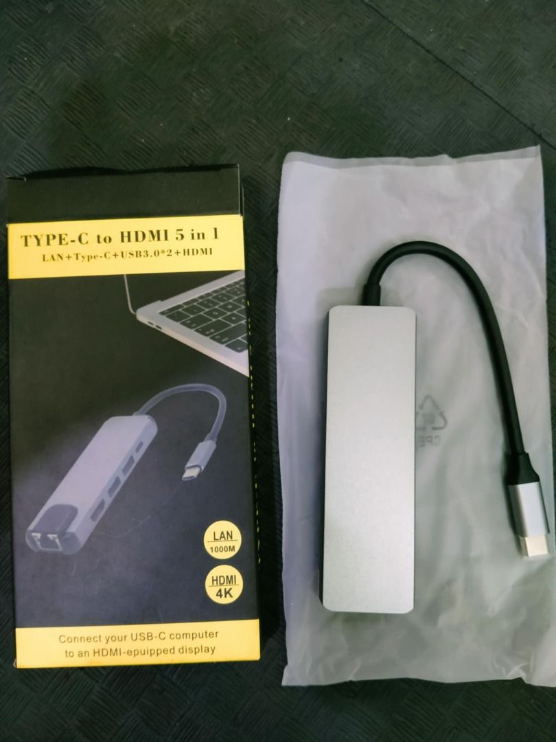 Type-C to HDTV 5-in-1 Hub (Category: Cables & Adaptors) located in Quezon City. Submitted by nearlink091613 (Listing ID 1406152358, Image 3). Description: FOR SALE! Type-C hub offers multiple ports for your devices. It includes LAN, Type-C, two USB 3.0 ports, and an HDTV port. The hub is designed to connect various devices to your laptop or other Type-C enabled devices. It allows you to expand your connectivity options with a single adapter. FORE