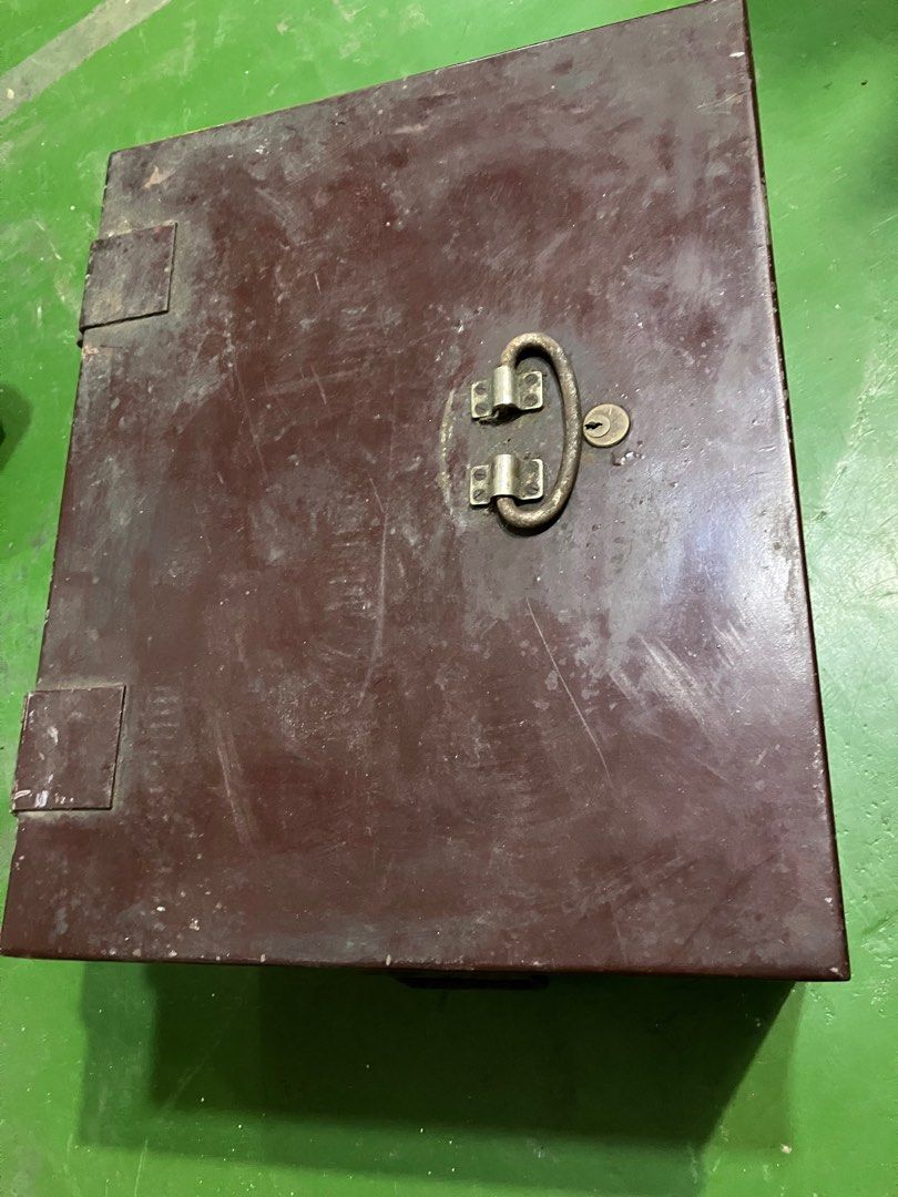 Vintage Metal Safe Box without key (Category: Safe) located in Angeles City. Submitted by jnwsurplus (Listing ID 1406237812, Image 1). Description: - Vintage metal safe box - Secure lock with key - Features a handle for easy carrying - Rectangular shape with hinged lid - Dark brown exterior - Made of metal.