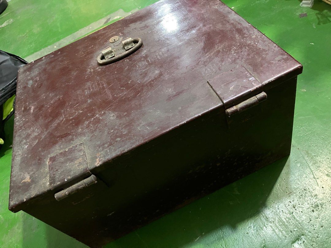 Vintage Metal Safe Box without key (Category: Safe) located in Angeles City. Submitted by jnwsurplus (Listing ID 1406237812, Image 3). Description: - Vintage metal safe box - Secure lock with key - Features a handle for easy carrying - Rectangular shape with hinged lid - Dark brown exterior - Made of metal.
