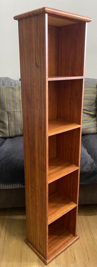 Wooden Bookshelf with Shelves (Category: Shelves, Cabinets & Racks) located in Quezon City. Submitted by crbphl (Listing ID 1406106887, Image 2). Description: Wood Laminate Shelf Tower Ideal for small books, ornaments, Gaming CDs and DVDs Space saving, Easy to clean, Sturdy Good quality laminate. Easily Fits 19-26 CDs and 13DVDs per level Dimensions H 44.5” W 10” top D 8” Item available for pick up in QC Cash payment upon pick up or thru BDO pr B