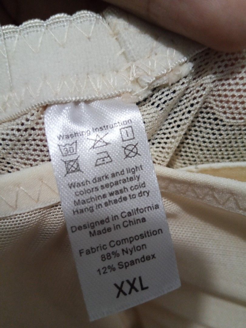 XXL Padded Shapewear Panties (Category: Undergarments & Loungewear) located in Santa Rosa. Submitted by briella1209 (Listing ID 1406111547, Image 3). Description: - Shapewear panties with padded design - Elegant floral lace pattern - Fabric: 88% Nylon, 12% Spandex - Size: XXL - Designed in California, made in China - Washing instructions on tag.
