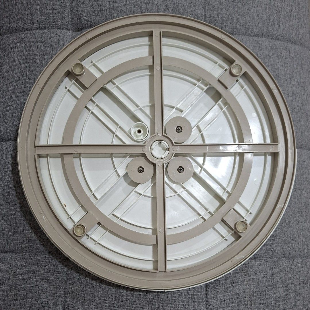 Youcopia Lazy Susan Turntable (Category: Food Organization & Storage) located in Pasig City. Submitted by avcan (Listing ID 1406101062, Image 3). Description: - 15.25 inches in diameter - Can pull out each quarter for better reach - White - Turns smoothly, no snags - Missing one screw at the bottom but does not affect the turns - Perfect for round dinner tables, or anywhere in the kitchen.
