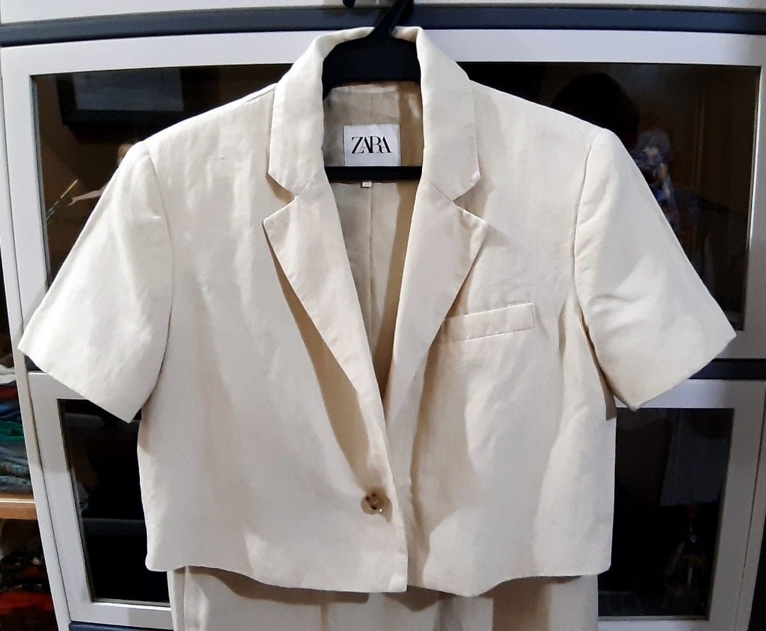 Zara Blazer and Wide Leg Pants Set (Category: Sets or Coordinates) located in Manila. Submitted by 88_anne (Listing ID 1406122529, Image 2). Description: - Zara cream-colored blazer and COS wide-leg pants - Blazer features short sleeves and single-button closure - Pants have a high waist and wide leg - Perfect for a chic, effortless look.