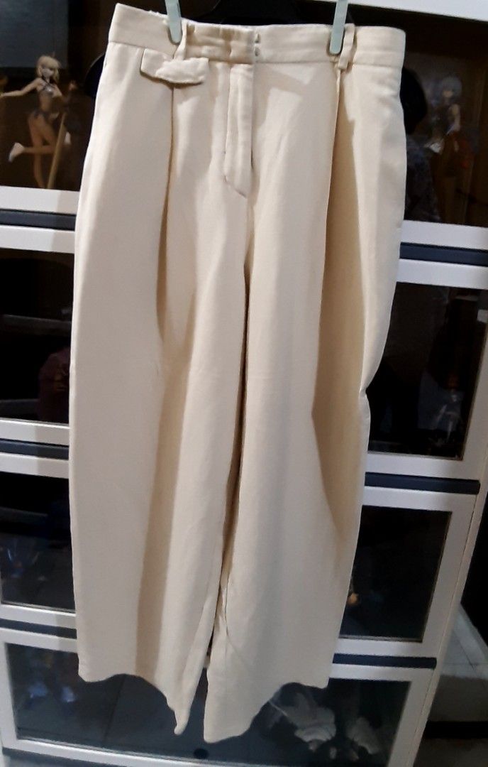 Zara Blazer and Wide Leg Pants Set (Category: Sets or Coordinates) located in Manila. Submitted by 88_anne (Listing ID 1406122529, Image 3). Description: - Zara cream-colored blazer and COS wide-leg pants - Blazer features short sleeves and single-button closure - Pants have a high waist and wide leg - Perfect for a chic, effortless look.