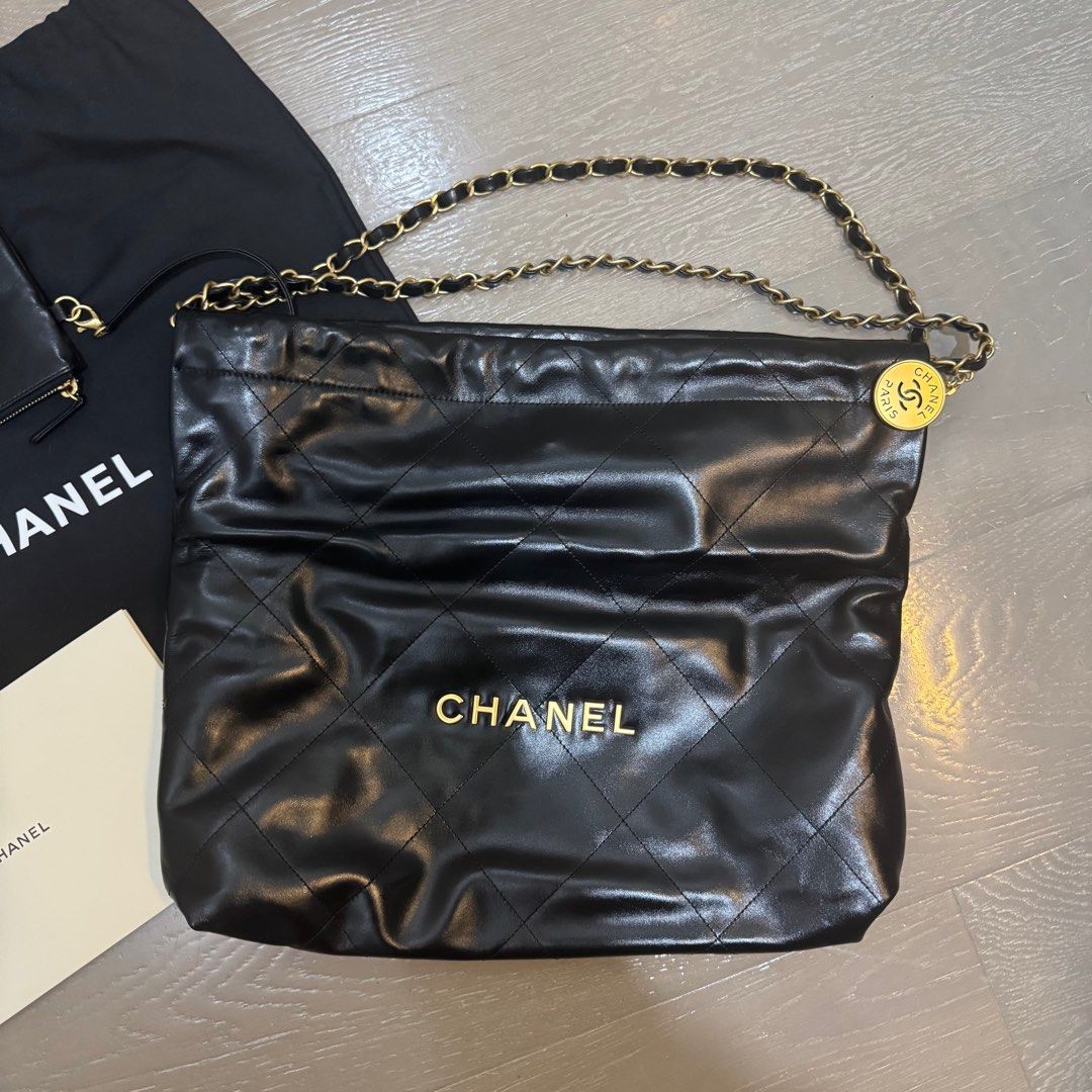 Chanel 22 Black Medium Hobo Bag (Category: Luxury Bags & Wallets) located in Makati City. Submitted by coppolasdaughter (Listing ID 1406385405, Image 2). Description: This exquisite calfskin handbag was acquired from an Instagram seller. It is in pristine condition and has been minimally used. Premium Quality. Buyers who request authenticity and pictures but fail to respond will be blocked. Let’s avoid wasting each other’s time and act responsibl