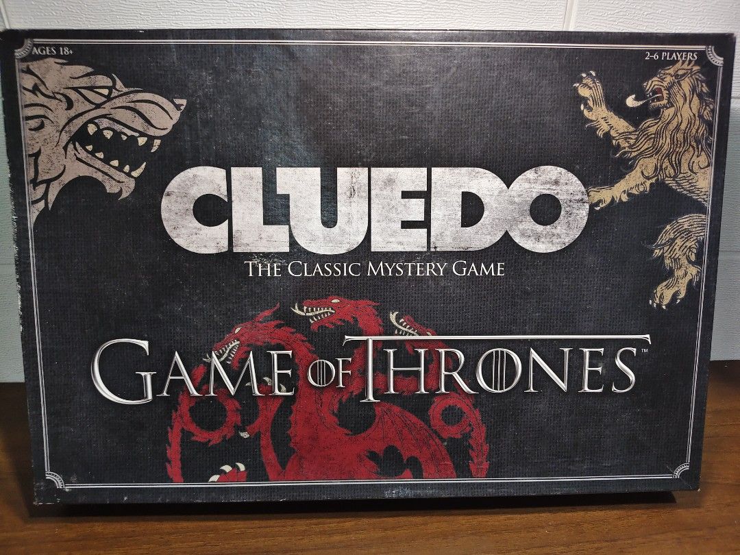 Cluedo Game of Thrones Board Game (Category: Board Games & Puzzles) located in Las Pinas. Submitted by mommy_14 (Listing ID 1406372826, Image 1). Description: - Game of Thrones Cluedo board game. - Features locations and characters from the TV series. - Includes game board, character cards, weapon tokens, and other game components. - For 2-6 players. - Complete set with box and all game pieces..