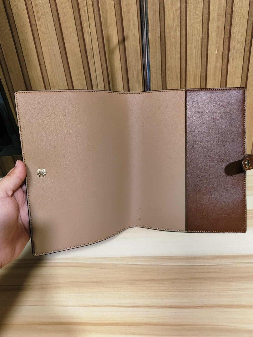 Coach Signature Organizer (Category: Accessory Holder, Box & Organizers) located in Manila. Submitted by oliviavaleria (Listing ID 1406380514, Image 3). Description: - Authentic Coach organizer - Signature Coach pattern exterior - Brown leather strap with snap closure - Light brown interior.