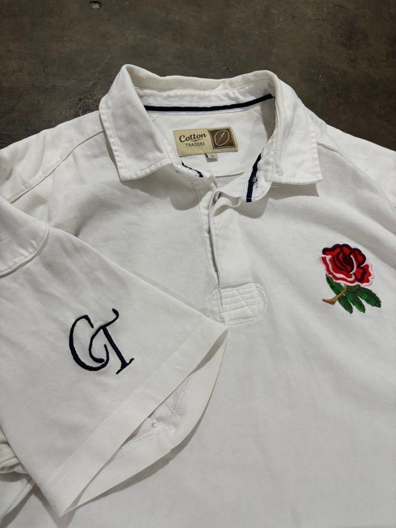 Cotton Traders Rugby Polo Shirt (Category: Tshirts & Polo Shirts ) located in Mandaluyong City. Submitted by mauithrift (Listing ID 1406355169, Image 3). Description: - Cotton Traders polo shirt - Size: L - Features: - Rose embroidery on chest - "CT" initials on sleeve - Brand name on collar - Material: 100% cotton.