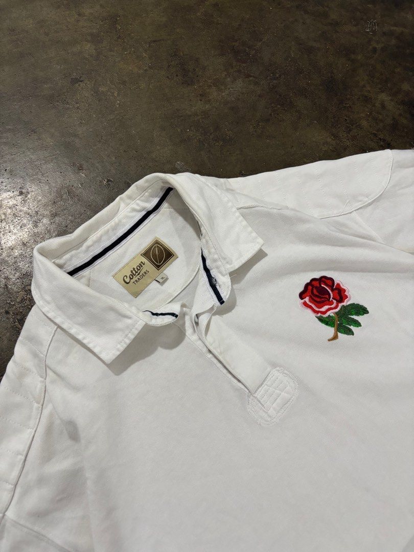 Cotton Traders Rugby Polo Shirt (Category: Tshirts & Polo Shirts ) located in Mandaluyong City. Submitted by mauithrift (Listing ID 1406355169, Image 2). Description: - Cotton Traders polo shirt - Size: L - Features: - Rose embroidery on chest - "CT" initials on sleeve - Brand name on collar - Material: 100% cotton.