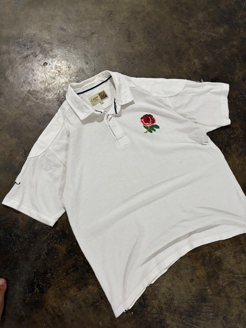 Cotton Traders Rugby Polo Shirt (Category: Tshirts & Polo Shirts ) located in Mandaluyong City. Submitted by mauithrift (Listing ID 1406355169, Image 1). Description: - Cotton Traders polo shirt - Size: L - Features: - Rose embroidery on chest - "CT" initials on sleeve - Brand name on collar - Material: 100% cotton.
