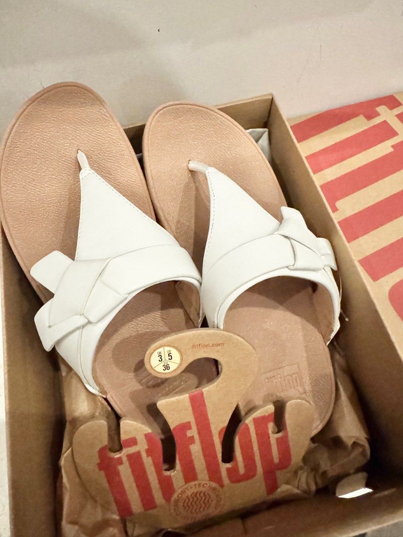 Fitflop Lulu FoldedKnot White US5 (Category: Sandals) located in Cainta. Submitted by tinmofilanda (Listing ID 1406413854, Image 1). Description: Fitflop Lulu FoldedKnot US5/EU36 White Original Brandnew ₱3,500 only Price from store is ₱6,795.00 RFS: wrong size.
