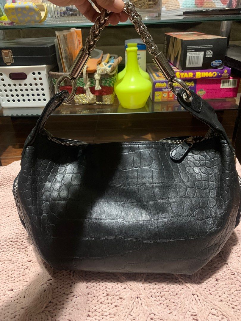 Furla Black Croc-Embossed Shoulder Bag (Category: Luxury Bags & Wallets) located in Bulacan. Submitted by love2loved (Listing ID 1406407976, Image 1). Description: - Furla shoulder bag - Black croc-embossed leather - Silver chain strap - Zipper closure - Interior side pocket - Furla branded tag - "Made in Cambodia" tag - Leather material Good condition medium size silver hardwarw YKK zipper with free silver chain furla chain maganda ung leather y