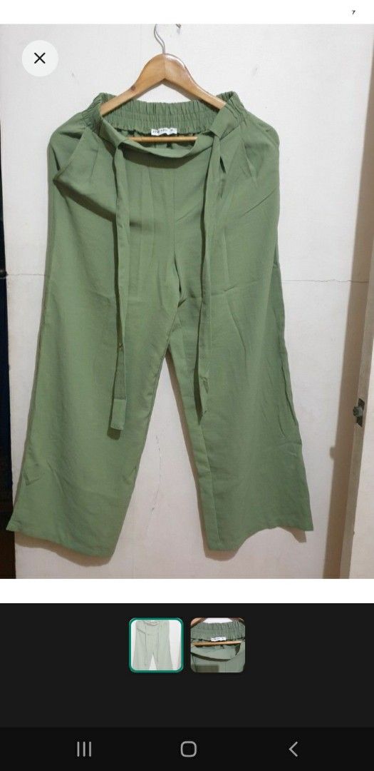 Green Wide Leg Pants with Tie (Category: Other Bottoms) located in Manila. Submitted by anchortees (Listing ID 1406365812, Image 1). Description: - Stylish green wide-leg pants - Comfortable elastic waistband with matching tie - Relaxed fit - Lightweight fabric, ideal for warm weather - Features side pockets - Versatile for various outfits.