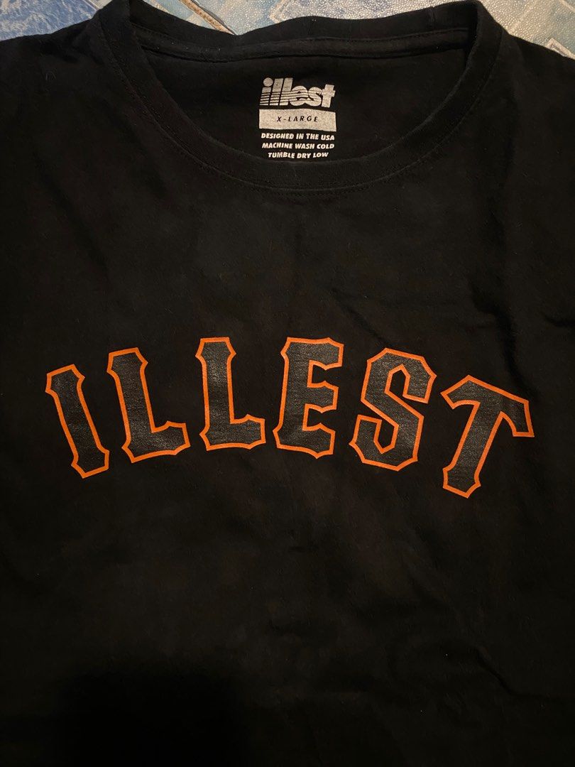Illest Graphic Tshirt (Category: Tshirts & Polo Shirts ) located in Navotas City. Submitted by patrickvarg (Listing ID 1406346328, Image 3). Description: XL on tag 22x28 Issue as shown in the picture. Need wash.