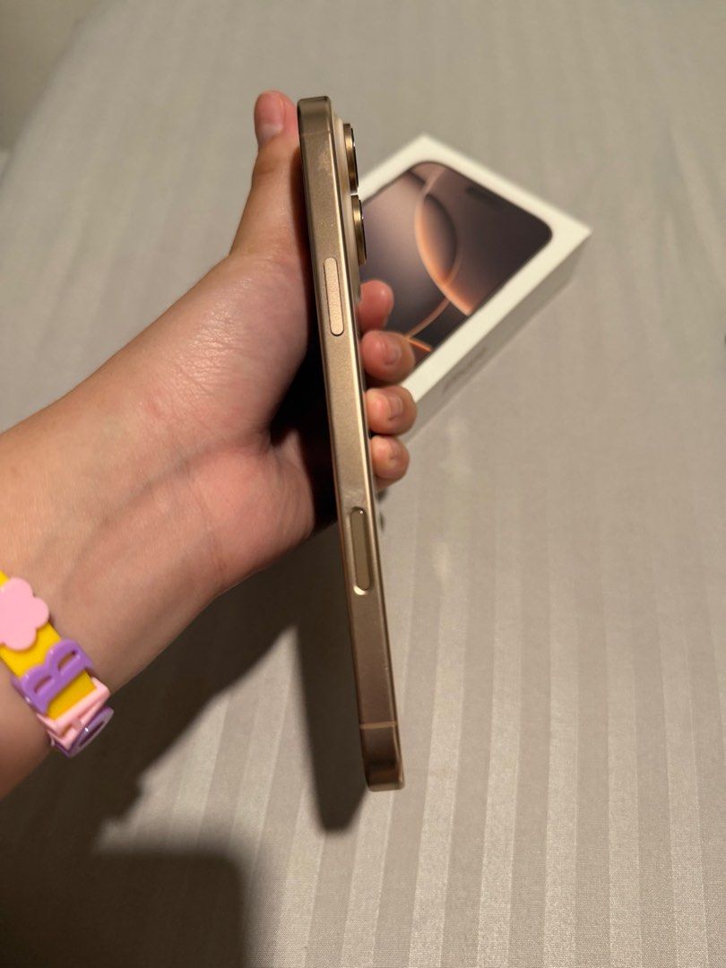 Iphone 16 pro max (Category: iPhone 16 Series) located in Malabon City. Submitted by closetfuel (Listing ID 1406355896, Image 2). Description: Iphone 16 promax for sale - bought sa powermac - warranty feb 28 2026 - with box only Honest issue: may paint chips lang dahil sa casing other than that super kinis na. Meet up: sm grandcentral.