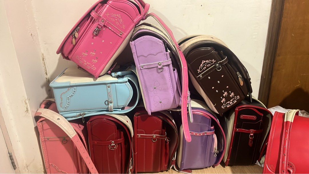 Japanese Style School Bags (Category: Backpacks) located in Bauang. Submitted by pinkaholicgirl (Listing ID 1406345945, Image 1). Description: - Available Colors: Pink, Red, Purple, Blue, Brown - Features: Bows and decorative patterns - Design: Classic, structured shape - Material: Durable - Ideal for: Carrying school essentials.