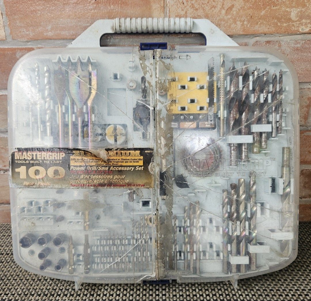 Mastergrip 100-Piece Power Drill/Saw Accessory Set (Category: Construction Tools & Equipment) located in Rizal. Submitted by cherry_garcia (Listing ID 1406386226, Image 3). Description: - Mastergrip 100-piece drill bit set - Includes a variety of drill bits - Features spade bits and hole saws - Suitable for various drilling and sawing tasks - Comes with a plastic carrying case for easy storage.
