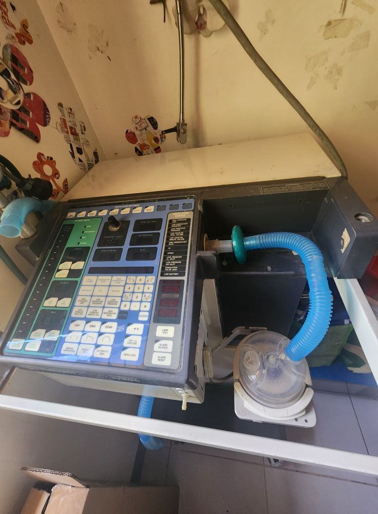 Medical Ventilator Machine (Category: Medical Supplies & Tools) located in Quezon City. Submitted by leah0118 (Listing ID 1406303933, Image 1). Description: - Medical ventilator machine - Includes control panel with buttons and displays - Comes with tubing and breathing circuit - Mounted on a stand - Features a clear plastic breathing chamber - Designed for respiratory support - price is negotiable.