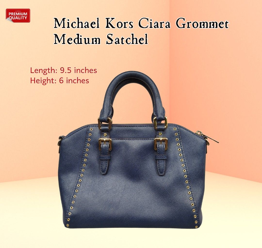 Michael Kors Ciara Grommet Medium Satchel (Category: Luxury Bags & Wallets) located in Baguio. Submitted by canadafashiondepot (Listing ID 1406351662, Image 2). Description: ✅ New Arrival from my Korean Box 🇰🇷 - Navy blue exterior - Top handle - Zip closure ✓ with minimal issue sa handle nia. Pero hindi halata. Check the image above. Hindi naman nakakabawas ng over all use nia.😀.