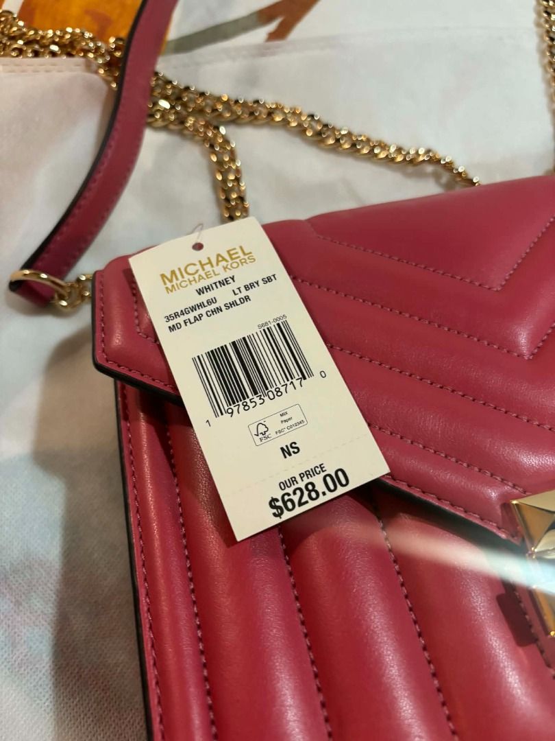Michael Kors Whitney Flap Chain Shoulder Bag (Category: Luxury Bags & Wallets) located in General Mariano Alvarez. Submitted by mihabubotz (Listing ID 1406393899, Image 1). Description: - Authentic Michael Kors Whitney shoulder bag - Stunning pink color with gold-tone hardware - Stylish chain strap - Secure flap closure - Multiple interior compartments - Includes original price tag - Comes with original dust bag.