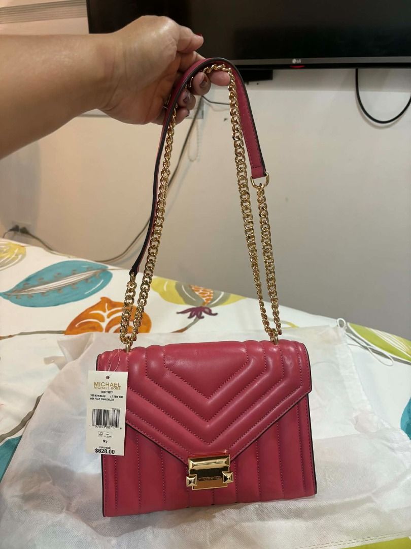 Michael Kors Whitney Flap Chain Shoulder Bag (Category: Luxury Bags & Wallets) located in General Mariano Alvarez. Submitted by mihabubotz (Listing ID 1406393899, Image 3). Description: - Authentic Michael Kors Whitney shoulder bag - Stunning pink color with gold-tone hardware - Stylish chain strap - Secure flap closure - Multiple interior compartments - Includes original price tag - Comes with original dust bag.
