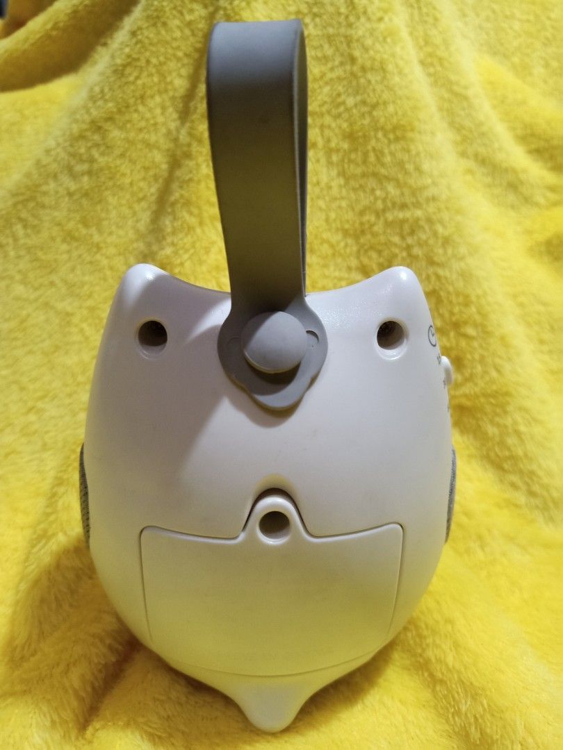 Owl Sound Machine (Category: Baby Monitors) located in Manila. Submitted by accessorixs (Listing ID 1406369877, Image 2). Description: - Owl-shaped sound machine - Easy to carry with a handle - Controls: Volume, track selection, power - Design: White face, gray accents, orange beak, gray mesh speaker cover - In good working condition.