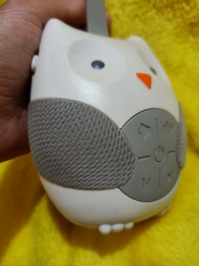 Owl Sound Machine (Category: Baby Monitors) located in Manila. Submitted by accessorixs (Listing ID 1406369877, Image 3). Description: - Owl-shaped sound machine - Easy to carry with a handle - Controls: Volume, track selection, power - Design: White face, gray accents, orange beak, gray mesh speaker cover - In good working condition.