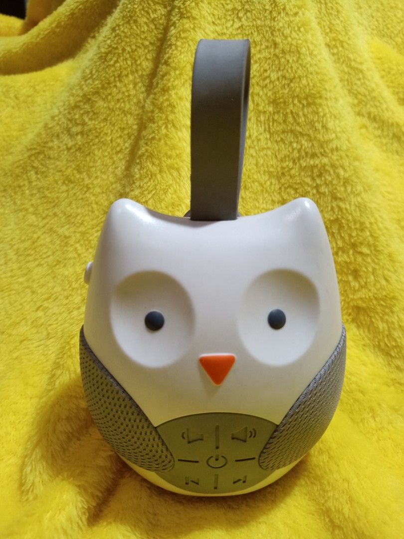Owl Sound Machine (Category: Baby Monitors) located in Manila. Submitted by accessorixs (Listing ID 1406369877, Image 1). Description: - Owl-shaped sound machine - Easy to carry with a handle - Controls: Volume, track selection, power - Design: White face, gray accents, orange beak, gray mesh speaker cover - In good working condition.